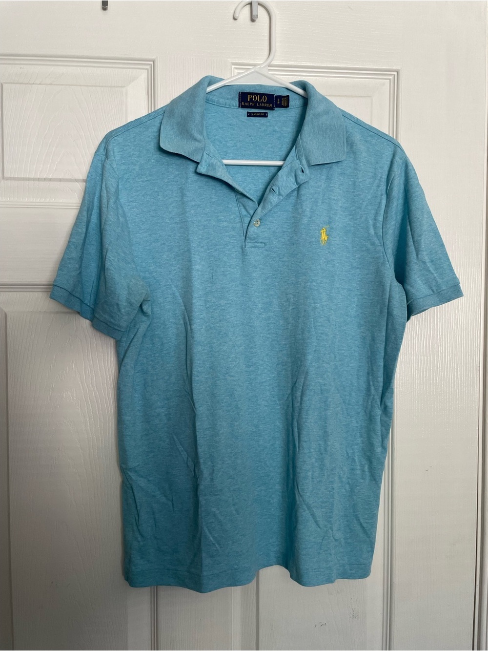 Polo by Ralph Lauren 100% Cotton Men’s size Small Light Blue Polo w Yellow Logo